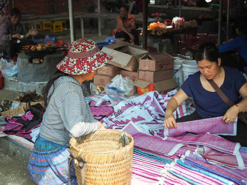 Pa Co market. Hmong ethnic handcrafts, handmade embroidering, traditional market